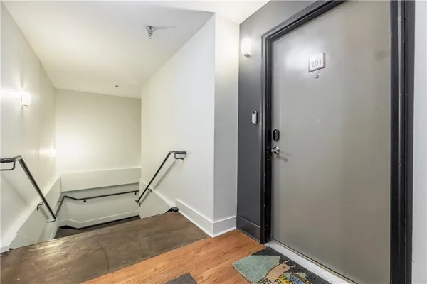 a view of a hallway with staircase