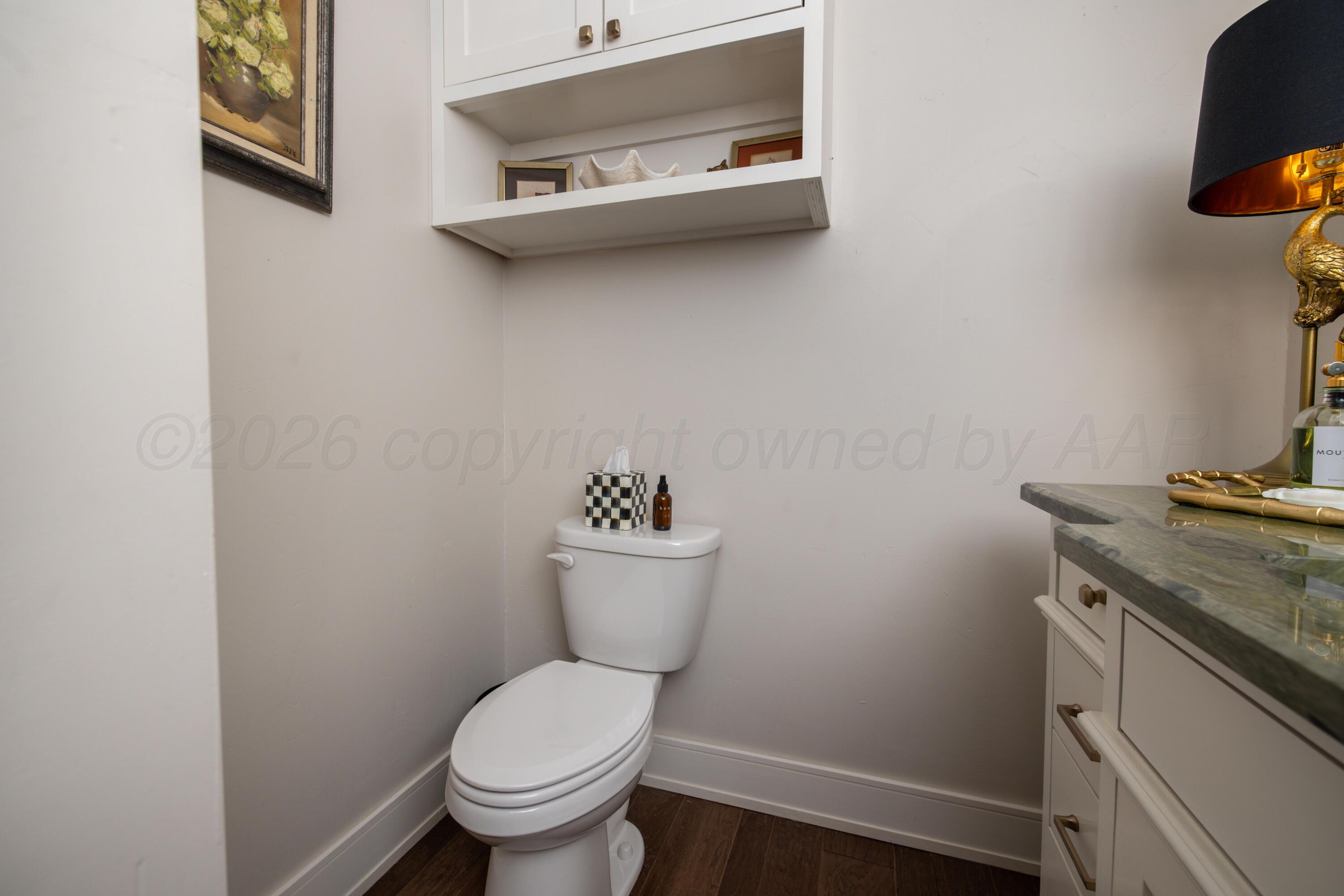 4508 South Rocking Chair Lane Amarillo, TX 79124 - Photo 21 of 48 a bathroom with a toilet and a sink