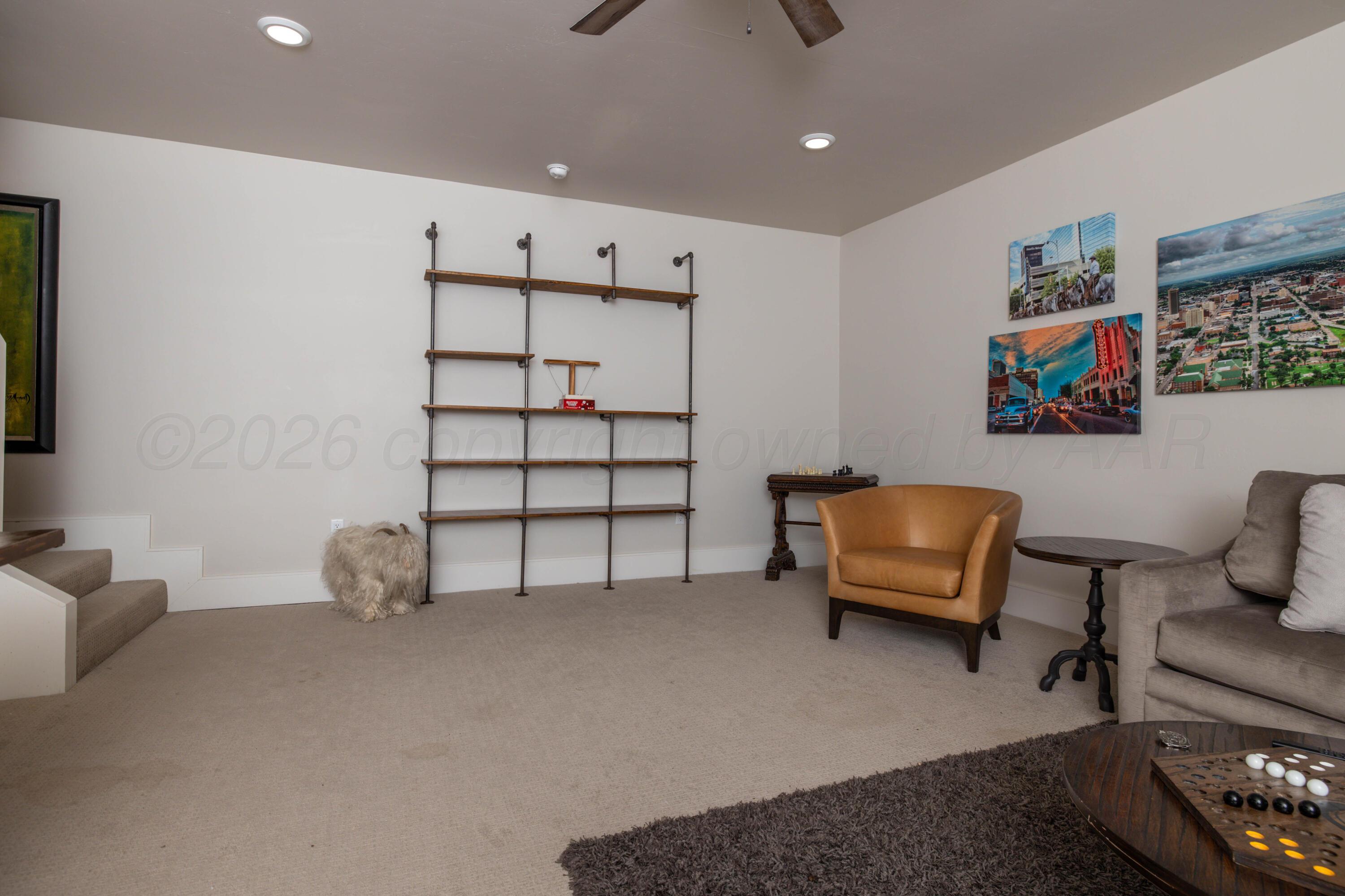 4508 South Rocking Chair Lane Amarillo, TX 79124 - Photo 33 of 48 a bedroom with furniture and a rug