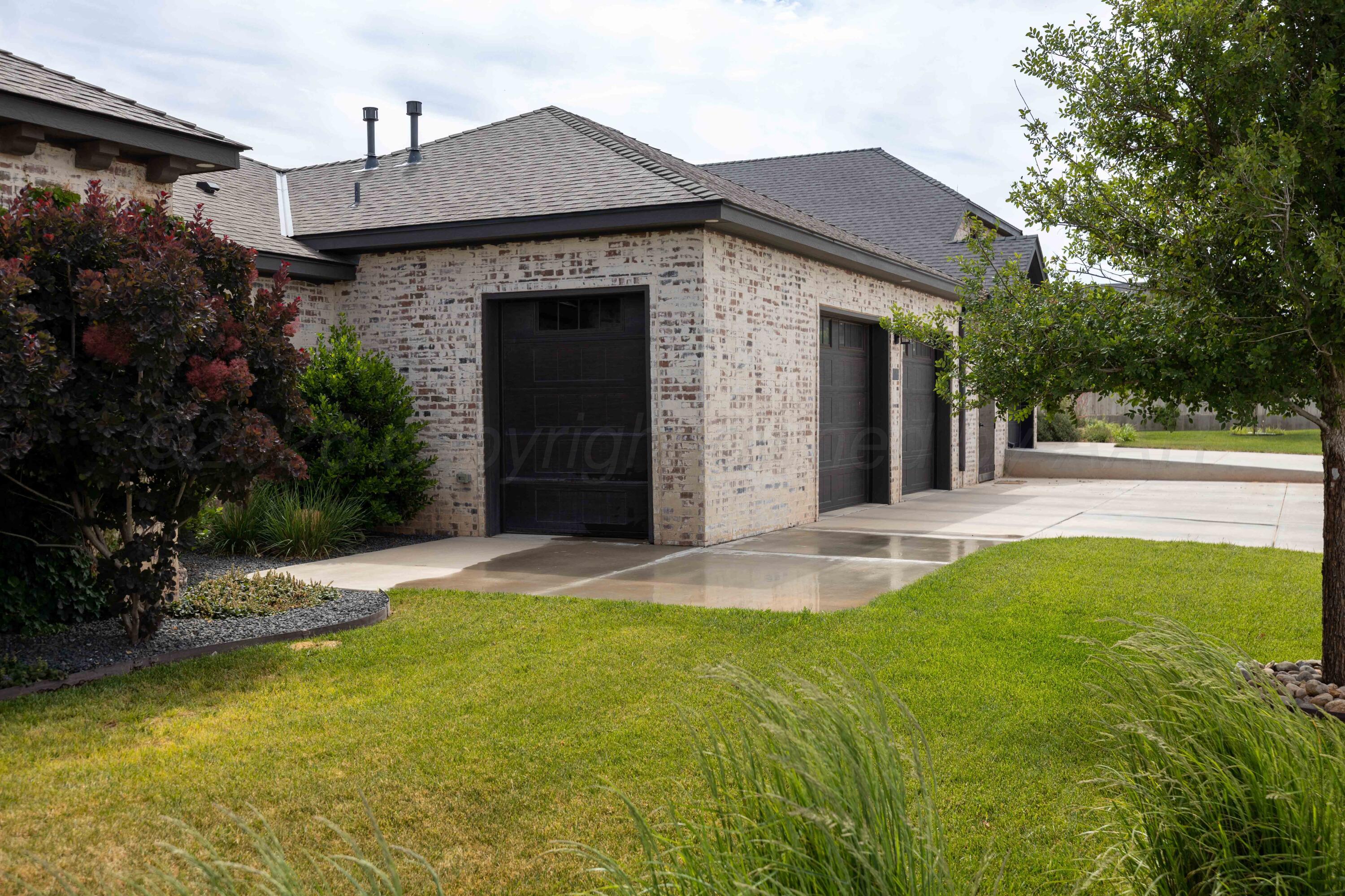 4508 South Rocking Chair Lane Amarillo, TX 79124 - Photo 41 of 48 a front view of a house with a yard
