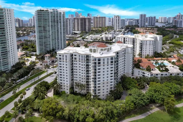 a view of a city with tall buildings