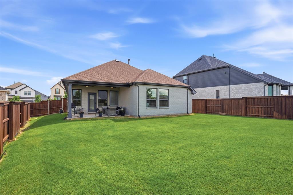 1632 Cotton Road Van Alstyne, TX 75495 - Photo 26 of 40 a front view of a house with yard porch and furniture