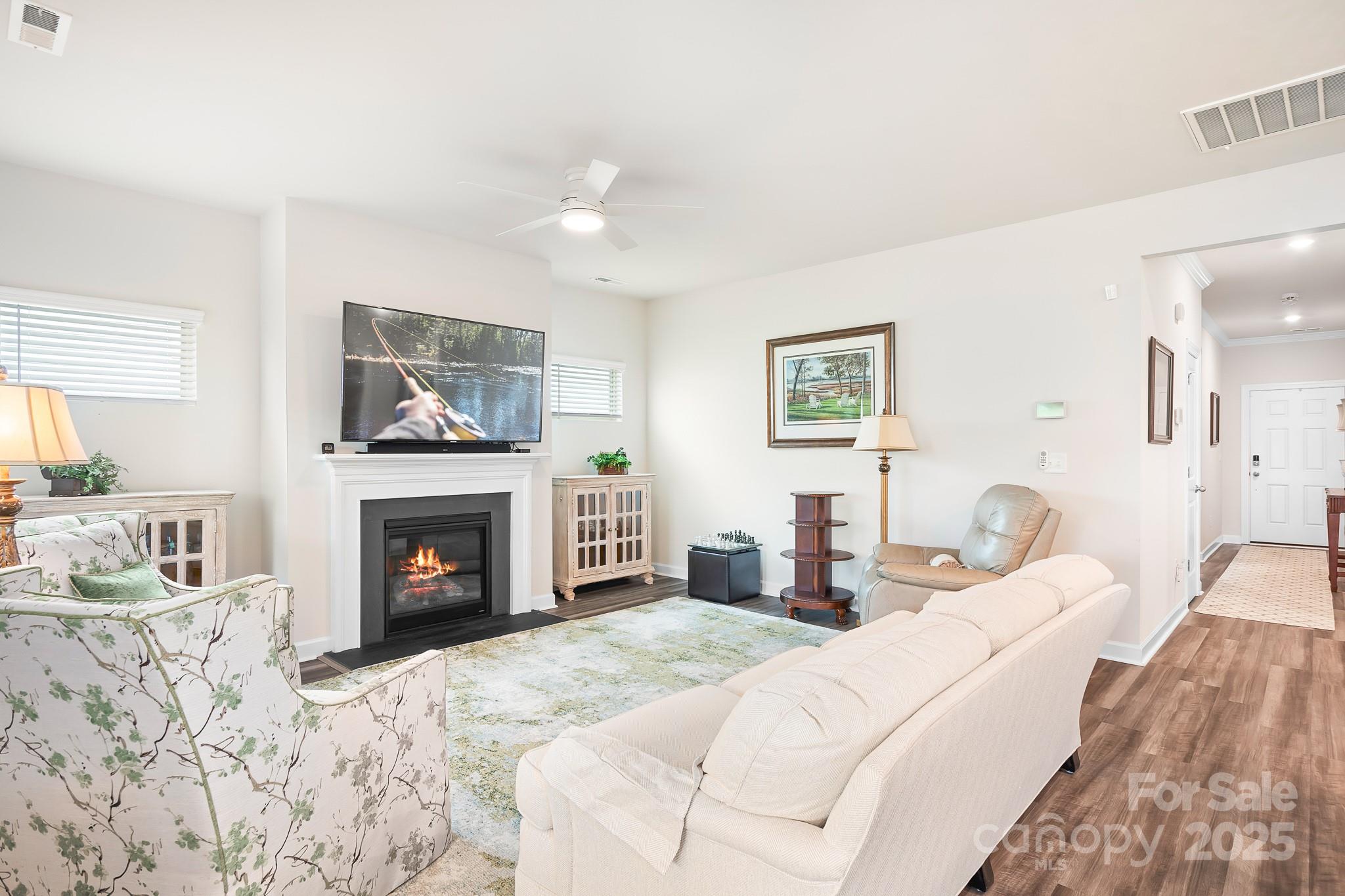 1885 Lotus Lane Denver, NC 28037 - Photo 15 of 43 a bedroom with a bed and a fireplace