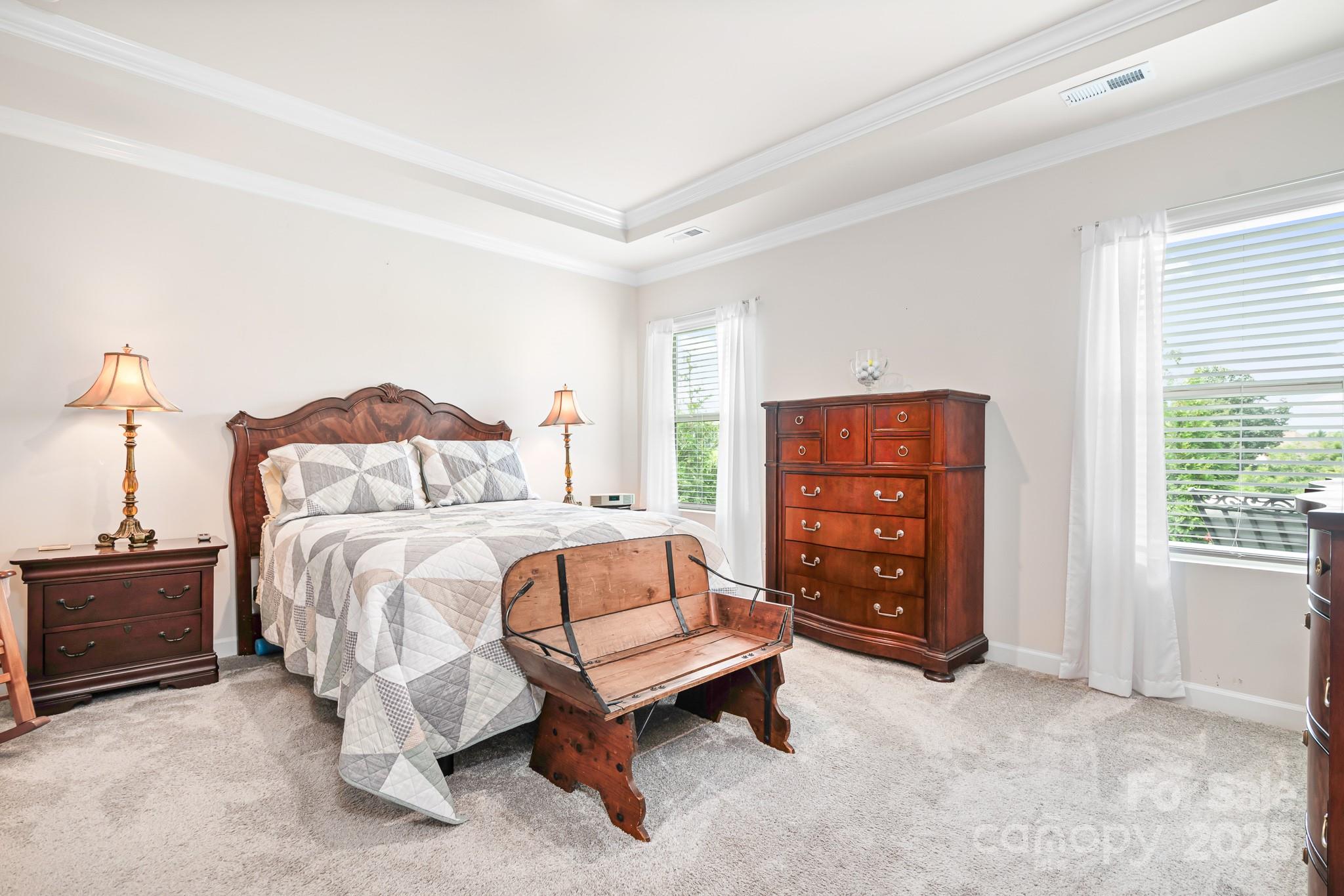 1885 Lotus Lane Denver, NC 28037 - Photo 16 of 43 a bedroom with a bed and a cabinets