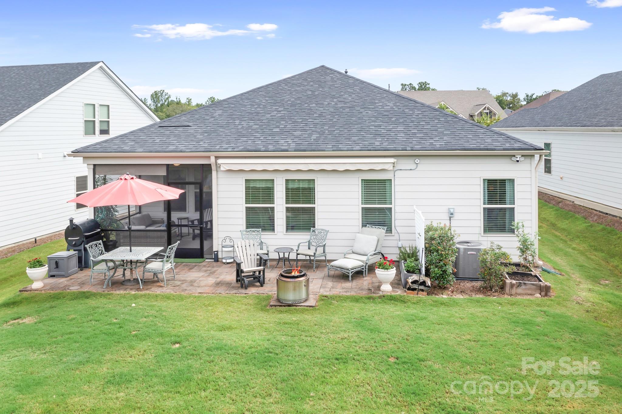 1885 Lotus Lane Denver, NC 28037 - Photo 42 of 43 a front view of house with yard and outdoor seating