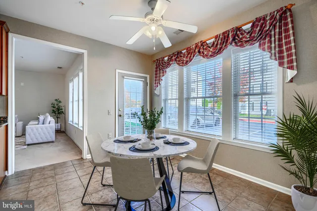a spacious bathroom with a double vanity sink a mirror and a shower