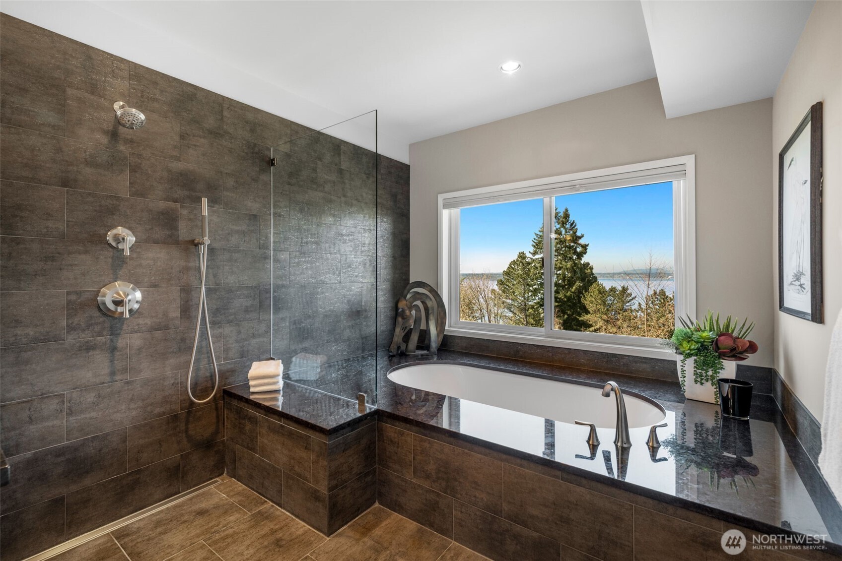 4017 56th Avenue Southwest Seattle, WA 98116 - Photo 17 of 39 a view of a bathroom with a tub and shower