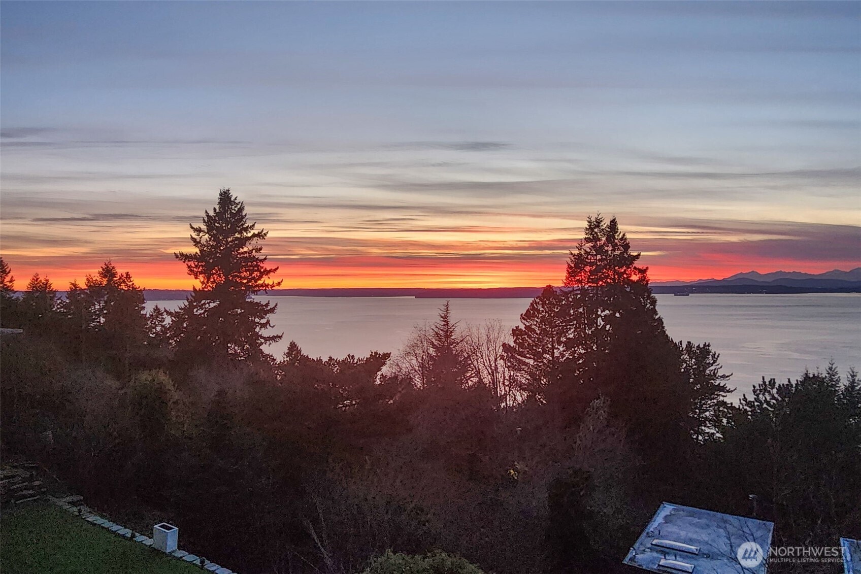 4017 56th Avenue Southwest Seattle, WA 98116 - Photo 18 of 39 a view of lake from a yard