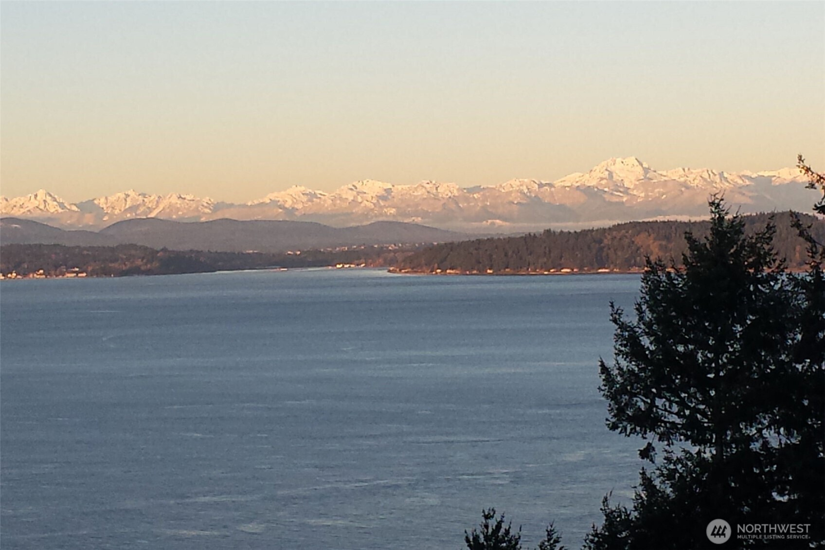 4017 56th Avenue Southwest Seattle, WA 98116 - Photo 21 of 39 a view of lake with mountain
