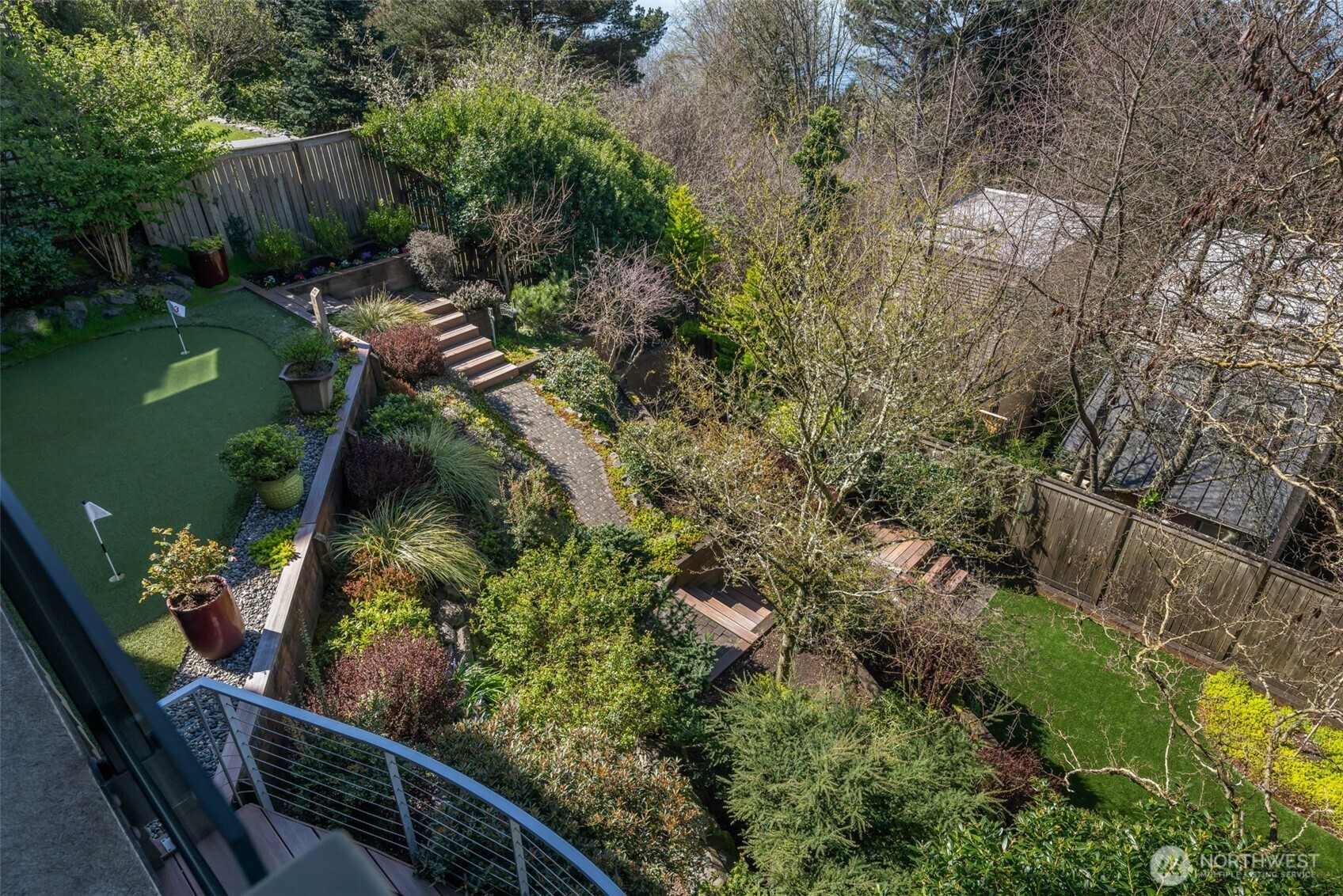 4017 56th Avenue Southwest Seattle, WA 98116 - Photo 37 of 39 a view of a garden with a pathway