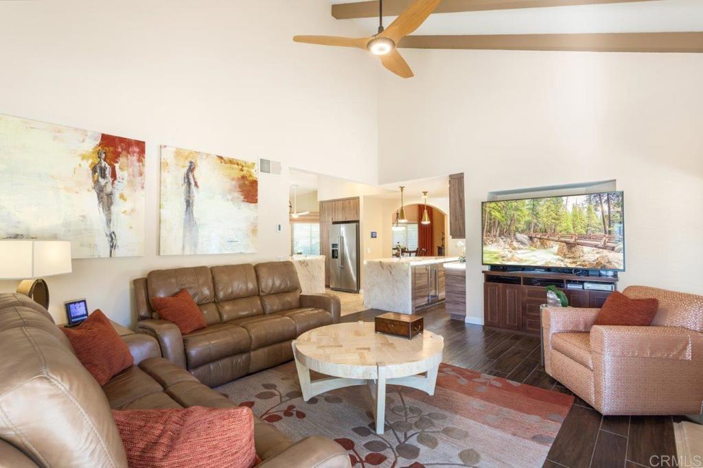 9369 Quail Canyon Road El Cajon, CA 92021 - Photo 16 of 43 a living room with furniture and a flat screen tv