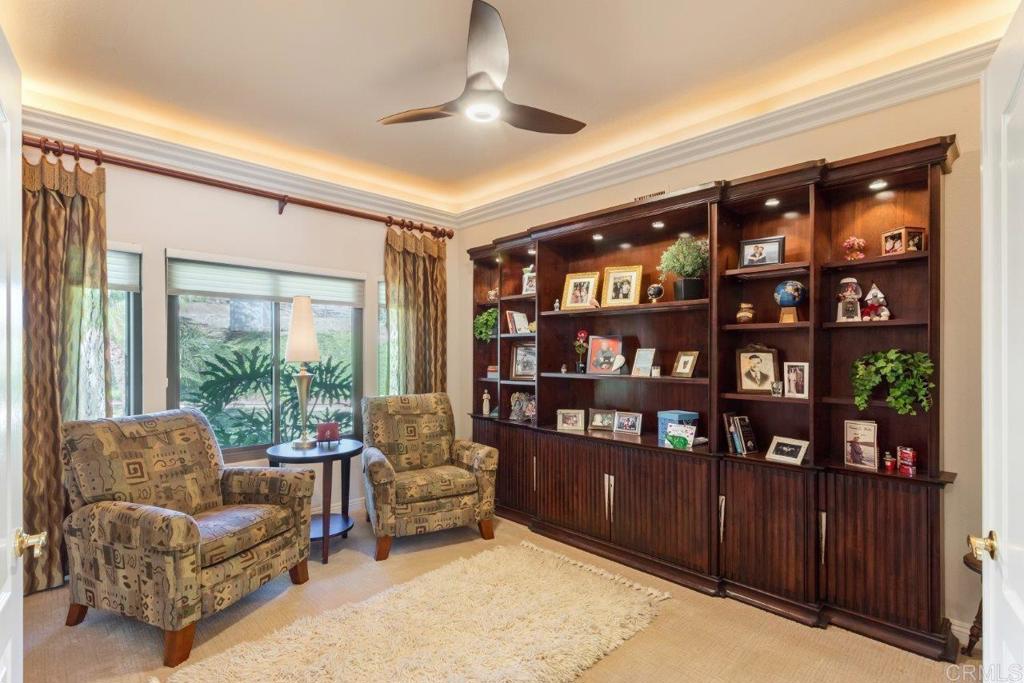9369 Quail Canyon Road El Cajon, CA 92021 - Photo 17 of 43 a living room with furniture cabinets and window