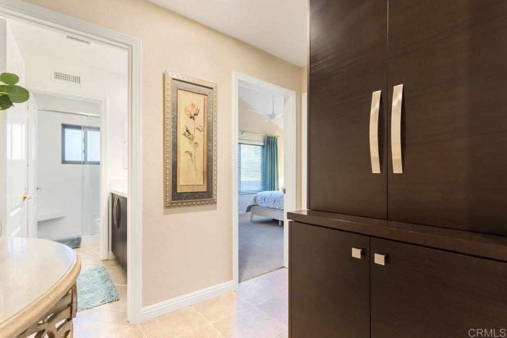 9369 Quail Canyon Road El Cajon, CA 92021 - Photo 18 of 43 a front view of a house with wooden floor and a sink