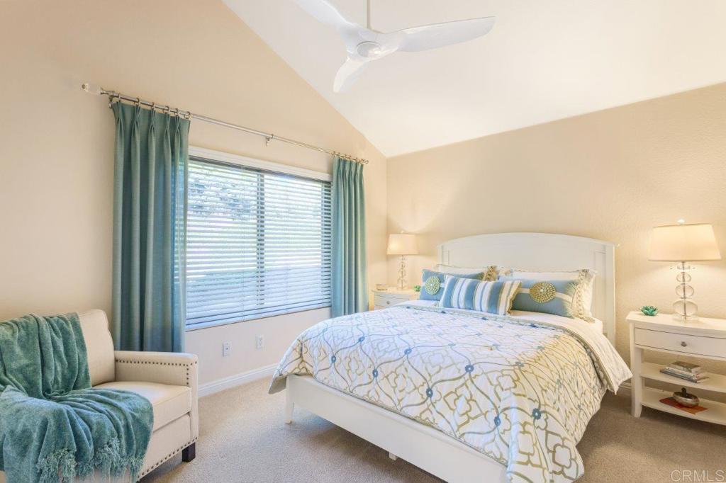 9369 Quail Canyon Road El Cajon, CA 92021 - Photo 22 of 43 a bedroom with a bed and a couch