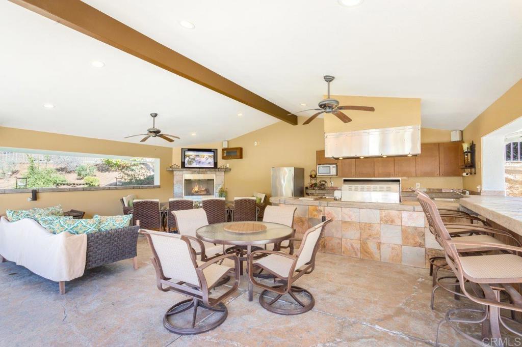 9369 Quail Canyon Road El Cajon, CA 92021 - Photo 35 of 43 a view of a dining room with furniture window and outside view