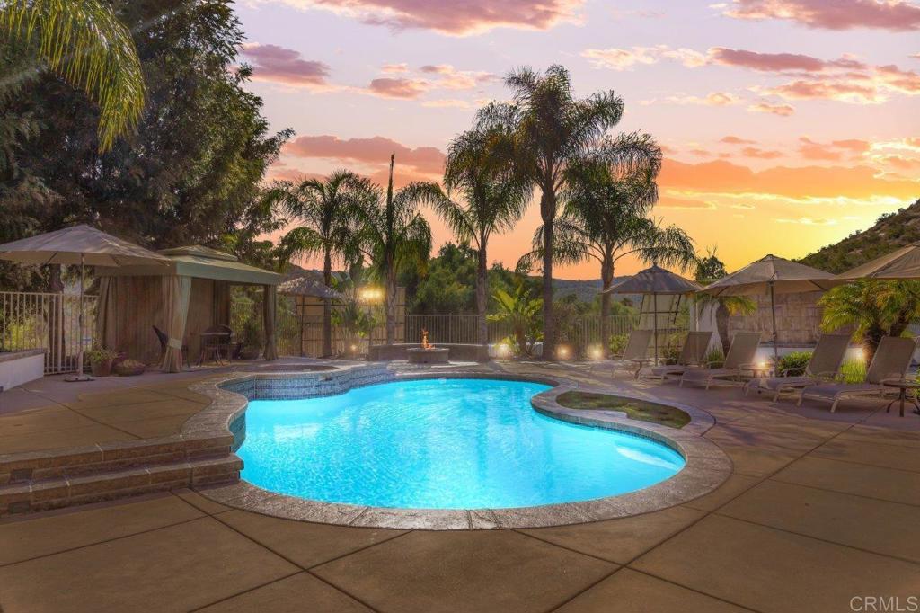 9369 Quail Canyon Road El Cajon, CA 92021 - Photo 38 of 43 a view of a swimming pool with lounge chair