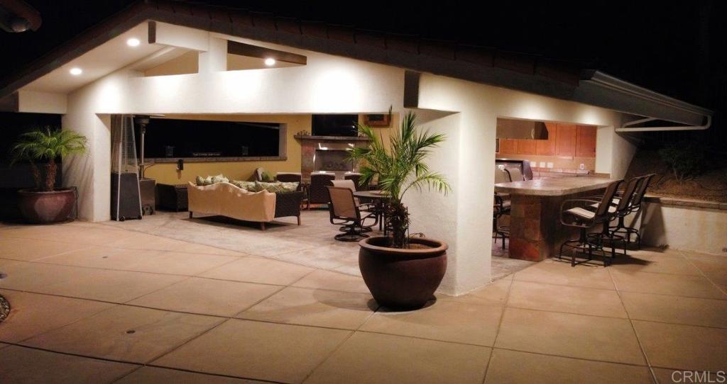 9369 Quail Canyon Road El Cajon, CA 92021 - Photo 42 of 43 a lobby with furniture and potted plants