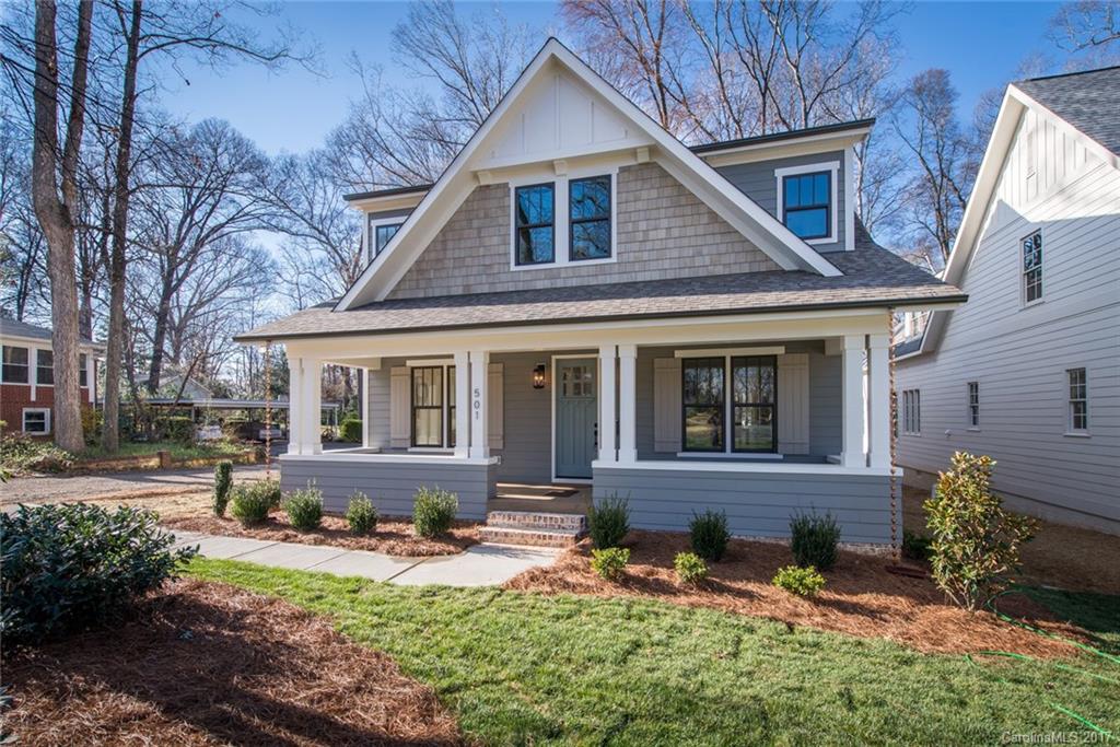 501 McAlway Road Charlotte, NC 28211 - Photo 1 of 24 a front view of a house with yard and green space