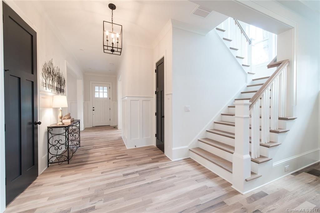 501 McAlway Road Charlotte, NC 28211 - Photo 13 of 24 a view of entryway and hall with wooden floor