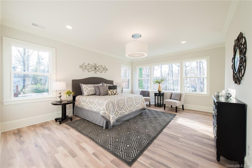 501 McAlway Road Charlotte, NC 28211 - Photo 16 of 24 a bedroom with a large bed and a window