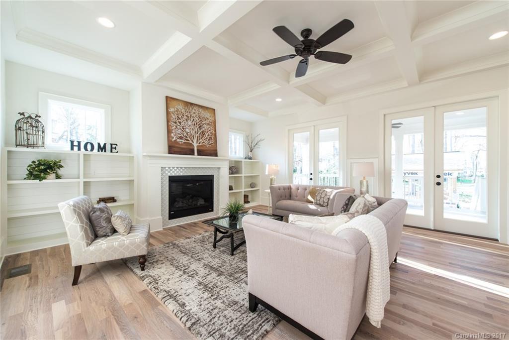 501 McAlway Road Charlotte, NC 28211 - Photo 3 of 24 a living room with furniture a large window with a fireplace