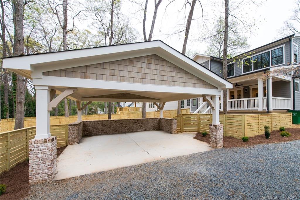 501 McAlway Road Charlotte, NC 28211 - Photo 22 of 24 a front view of a house with a yard and garage