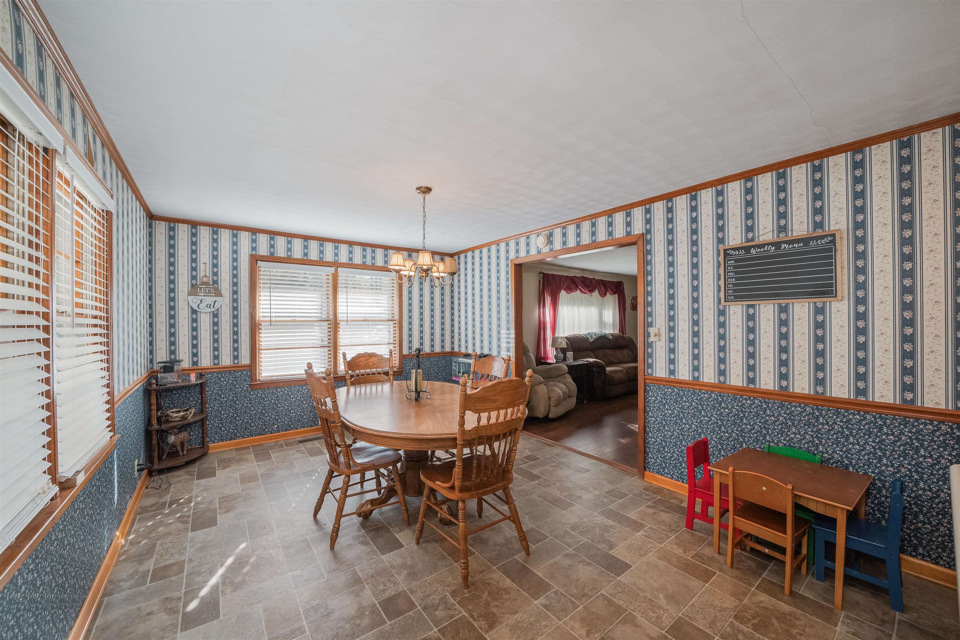 1315 Bishop Road Middleton, TN 38052 - Photo 8 of 31 Dining space featuring a chandelier and crown molding
