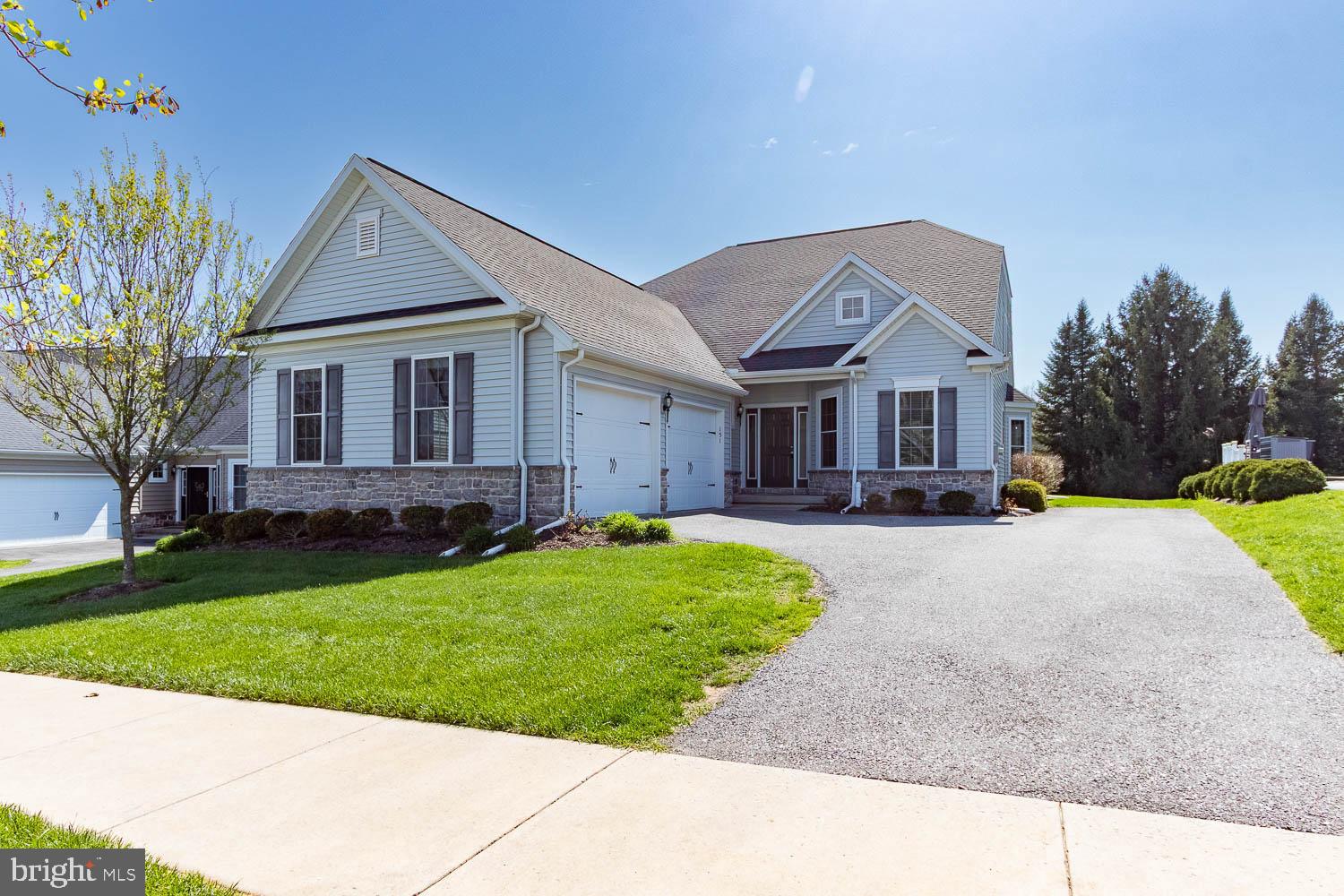 151 Rushcliffe Street State College, PA 16803 - Photo 1 of 50 a front view of a house with a yard and garage