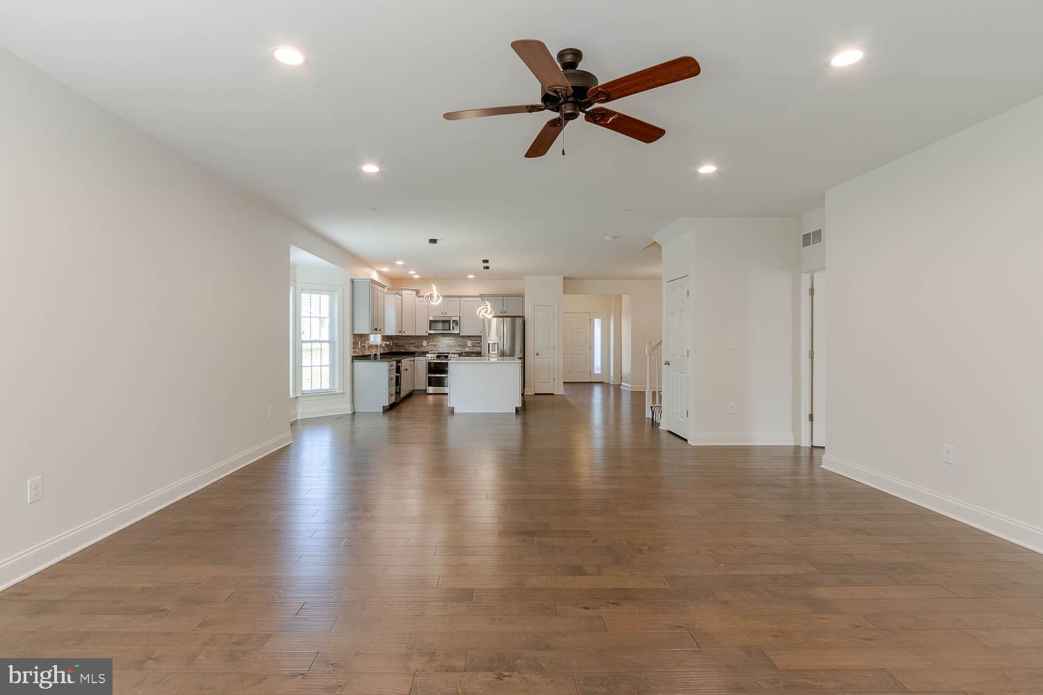 151 Rushcliffe Street State College, PA 16803 - Photo 14 of 50 a view of empty room with wooden floor and ceiling fan
