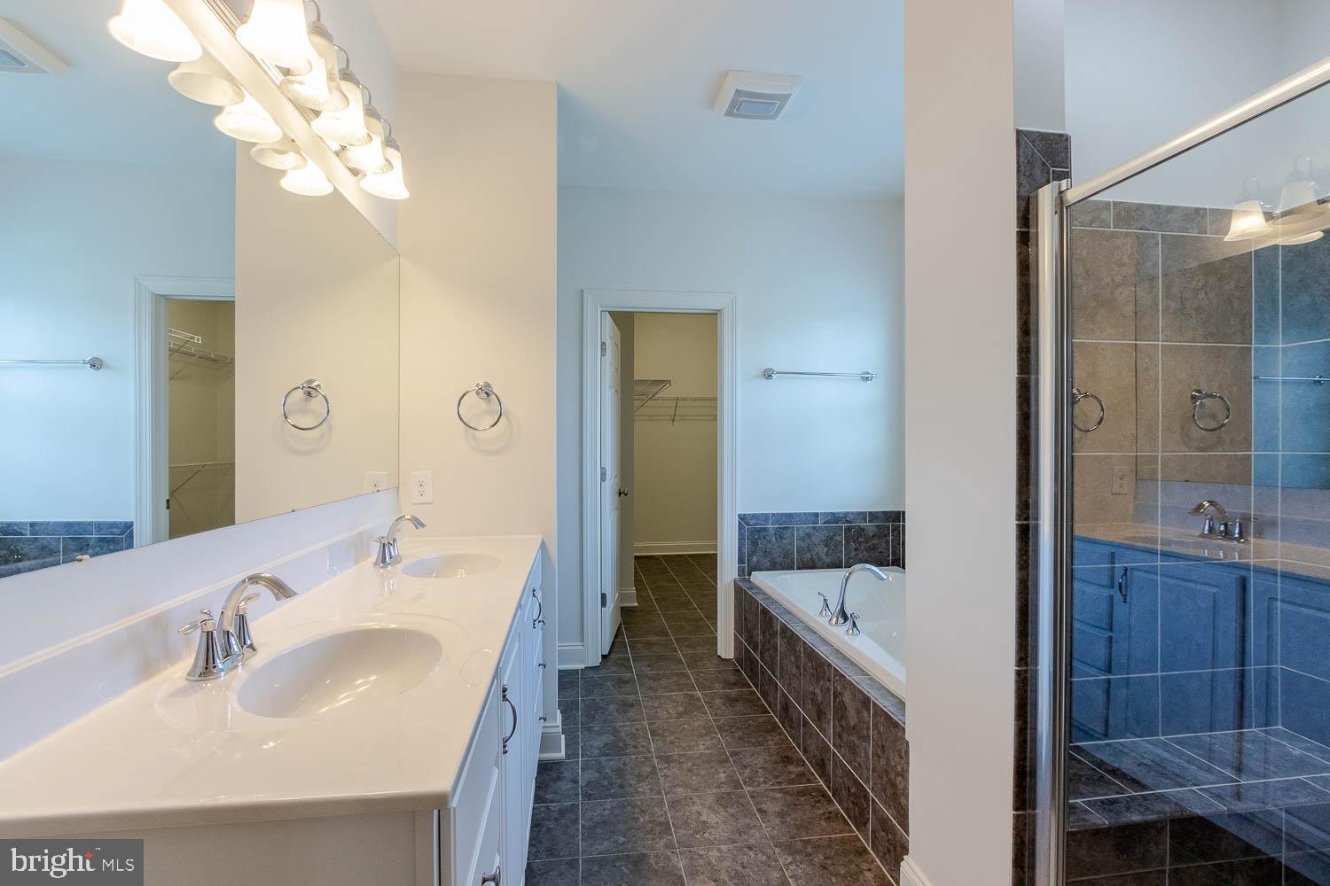 151 Rushcliffe Street State College, PA 16803 - Photo 18 of 50 a bathroom with a sink and a bathtub