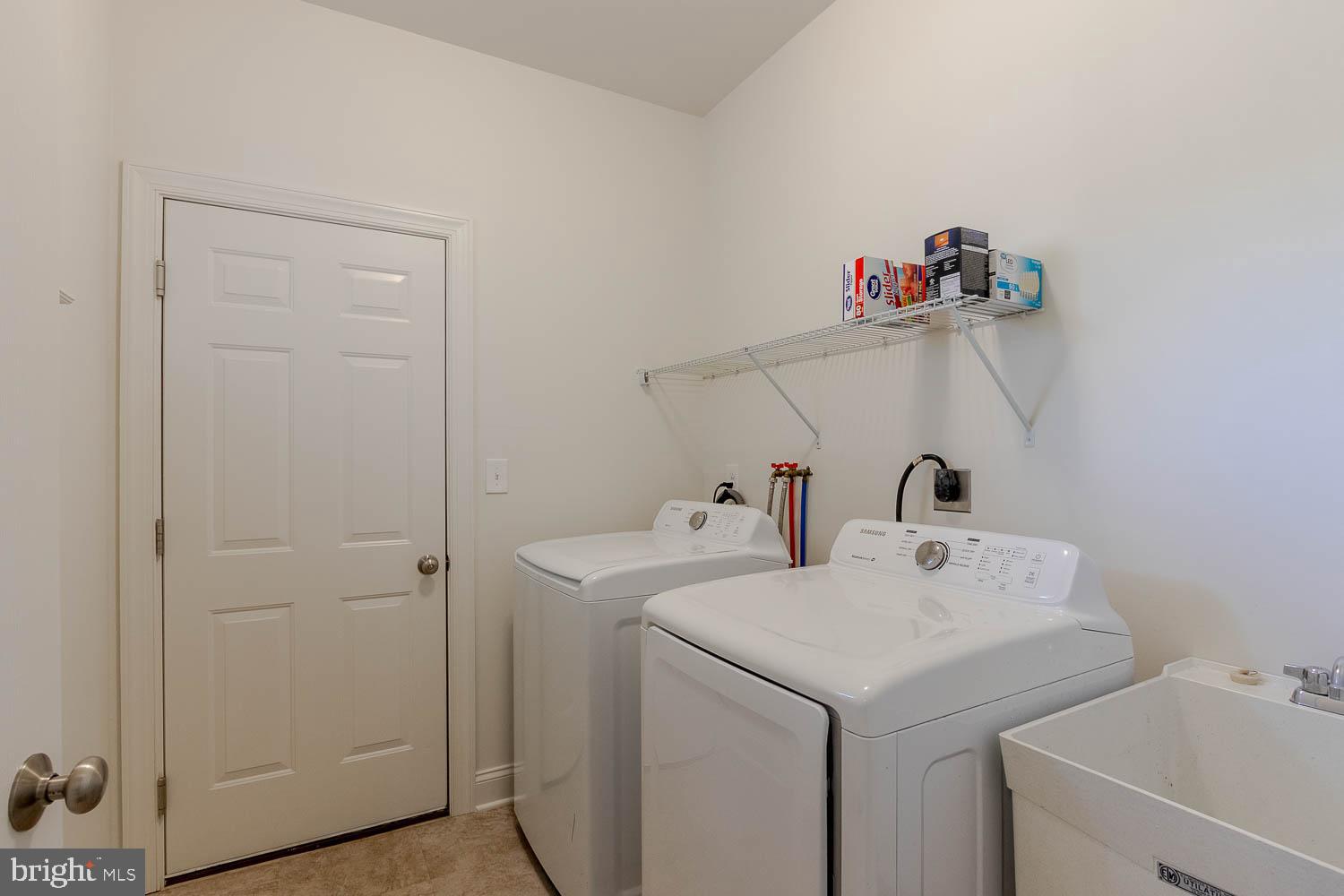 151 Rushcliffe Street State College, PA 16803 - Photo 22 of 50 a utility room with dryer and washer