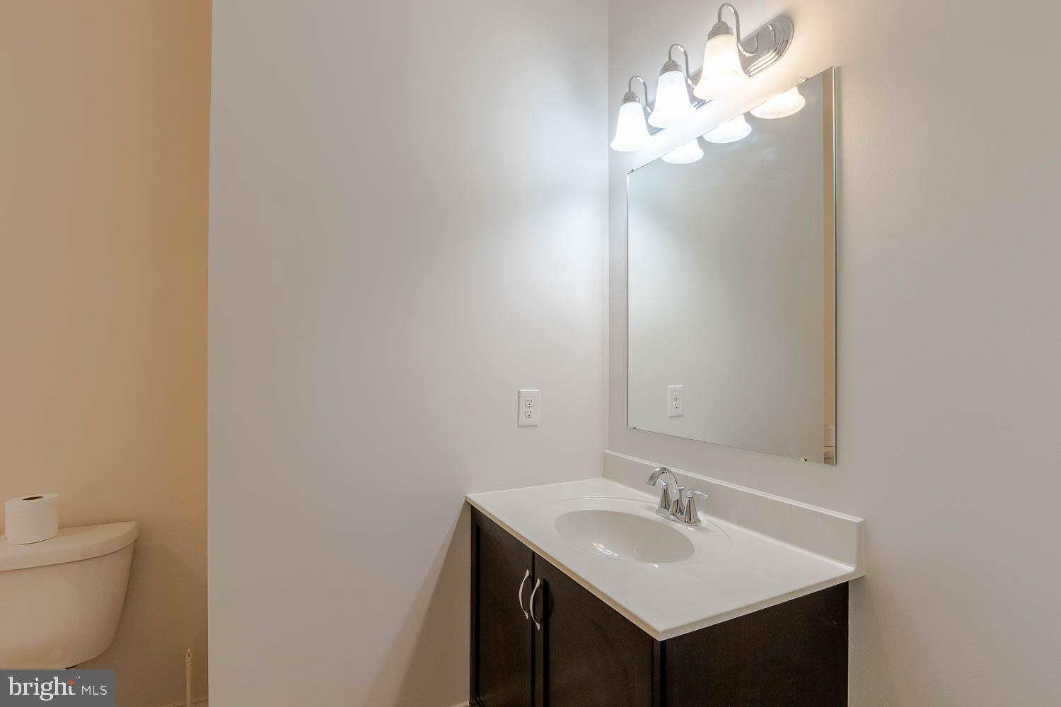 151 Rushcliffe Street State College, PA 16803 - Photo 23 of 50 a bathroom with a sink and a mirror