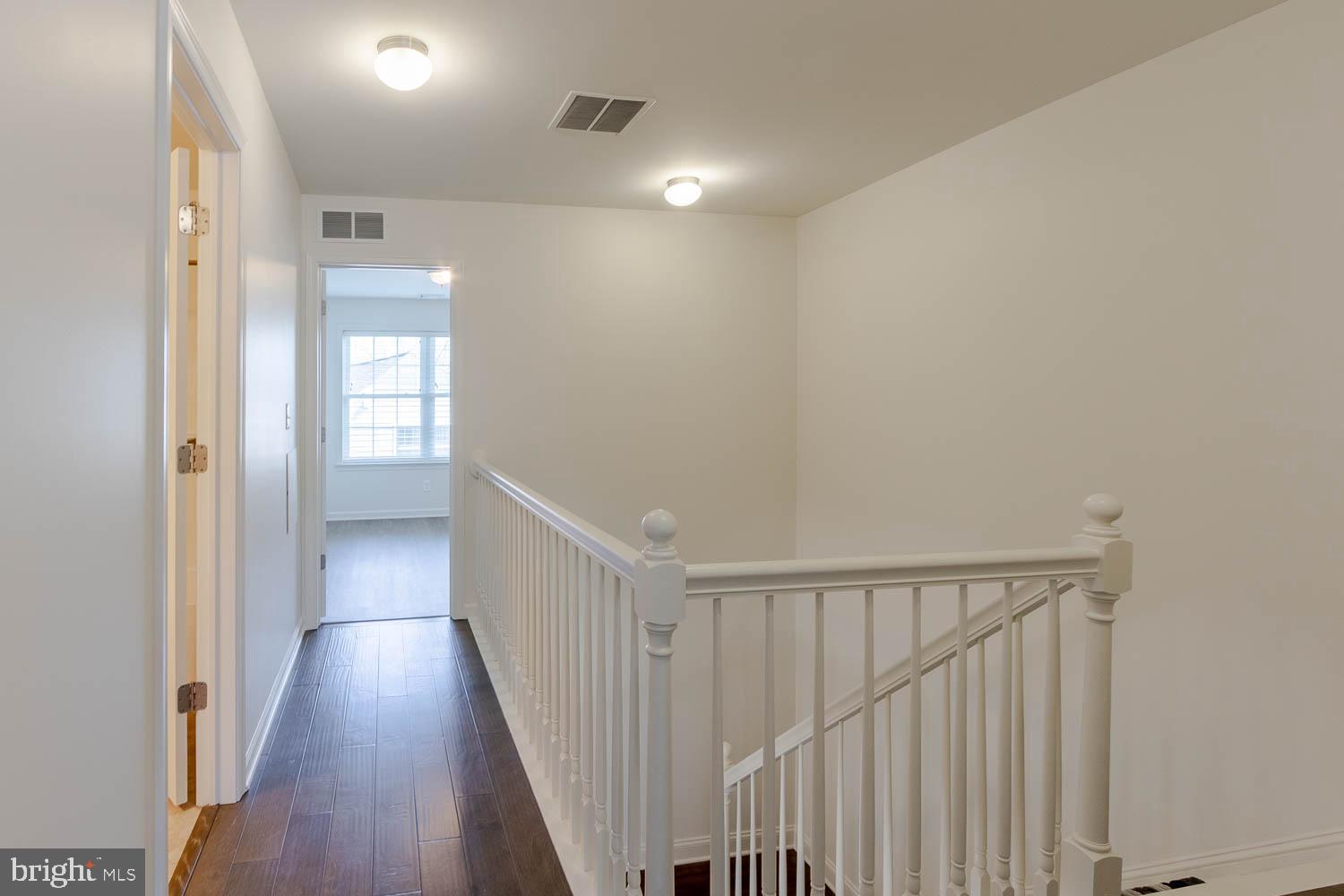151 Rushcliffe Street State College, PA 16803 - Photo 26 of 50 a view of a hallway with wooden floor