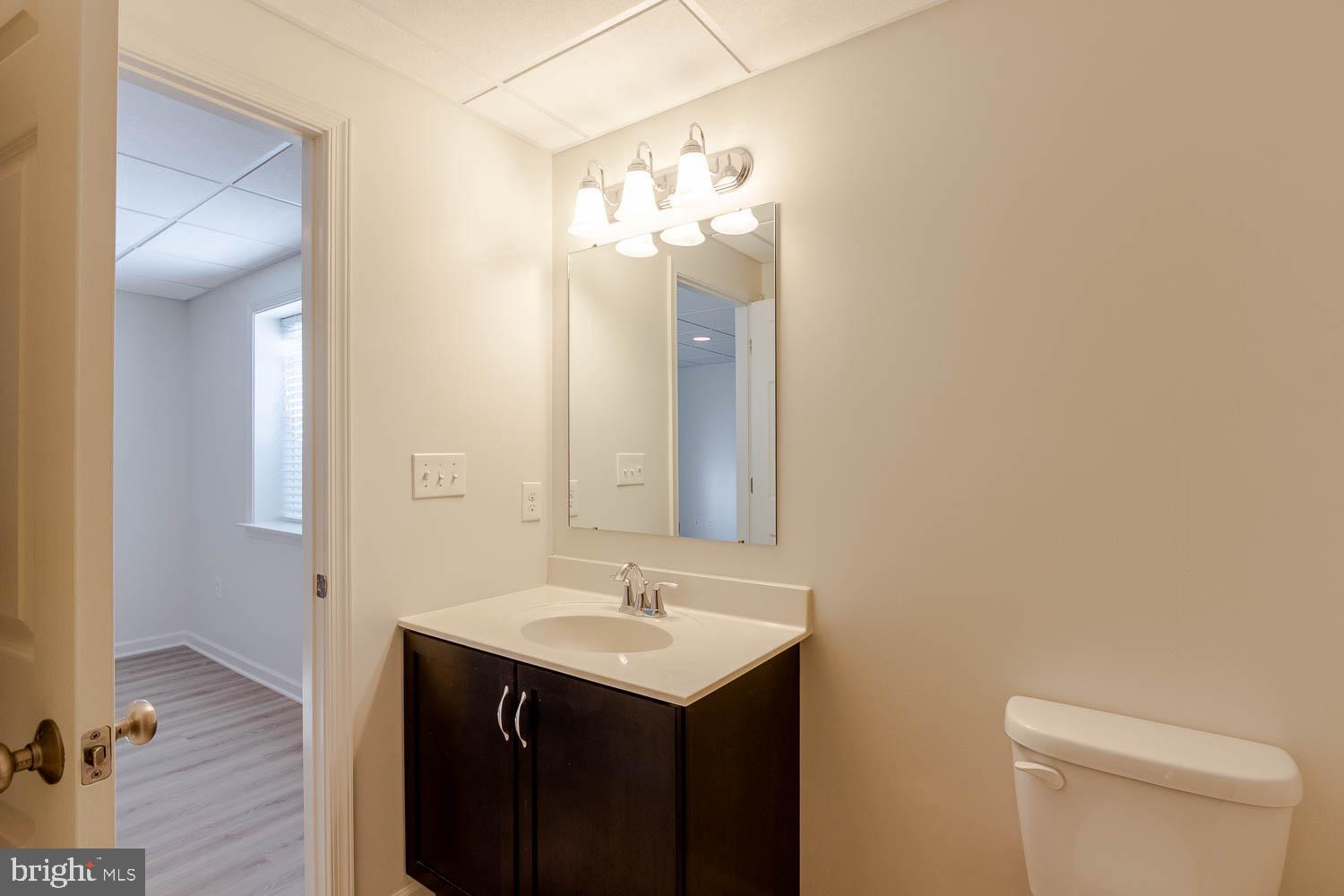 151 Rushcliffe Street State College, PA 16803 - Photo 42 of 50 a bathroom with a sink and a mirror