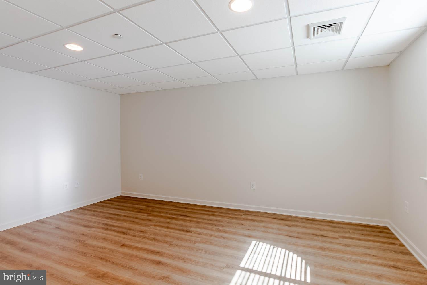 151 Rushcliffe Street State College, PA 16803 - Photo 43 of 50 a view of empty room with wooden floor