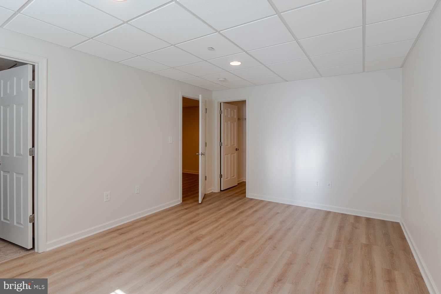 151 Rushcliffe Street State College, PA 16803 - Photo 44 of 50 a view of an empty room with wooden floor