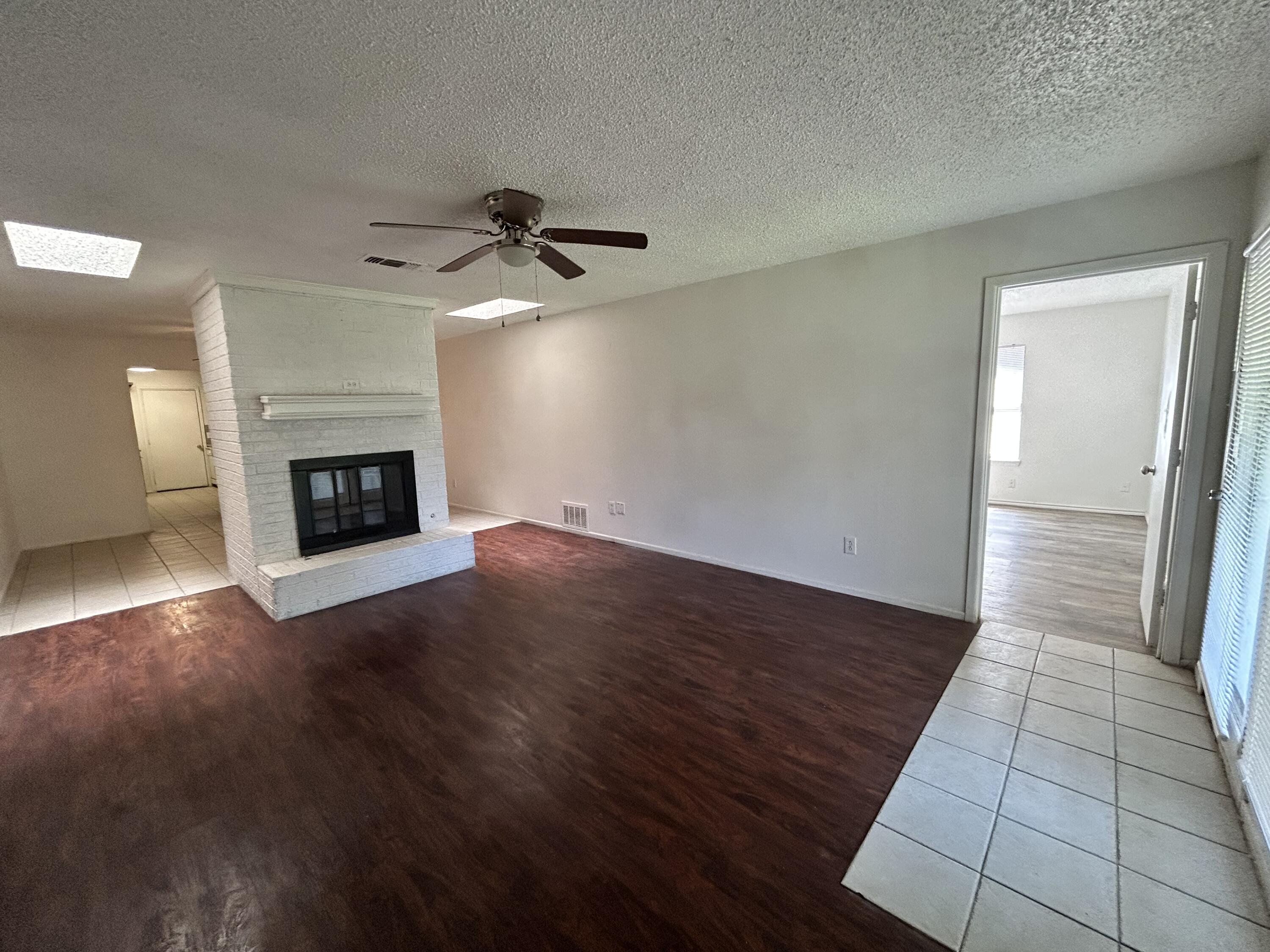 1303 80th Street, Unit A Lubbock, TX 79423 - Photo 5 of 16 IMG_0227