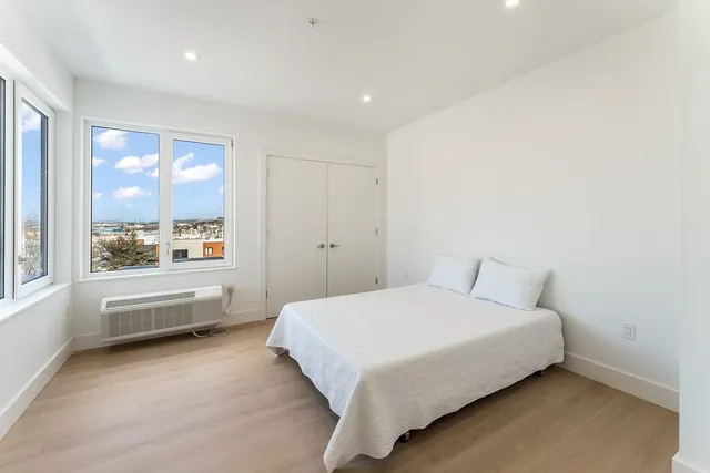 a bathroom with a bathtub and a sink