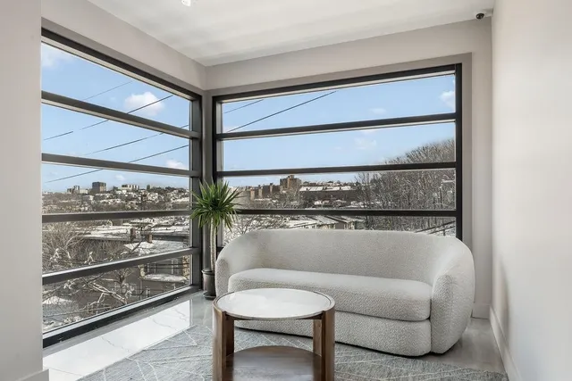 a view of parking garage with windows