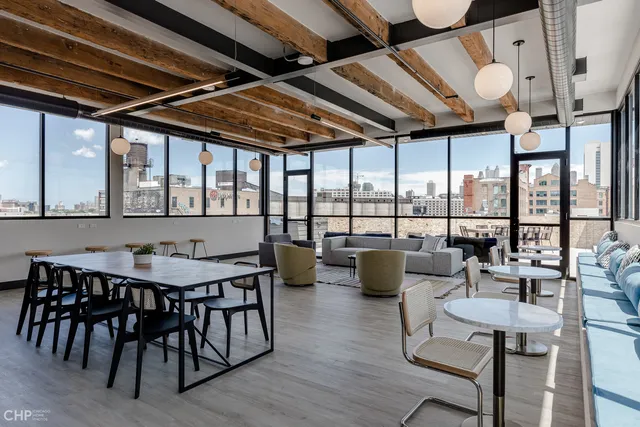 a view of a terrace with sitting area