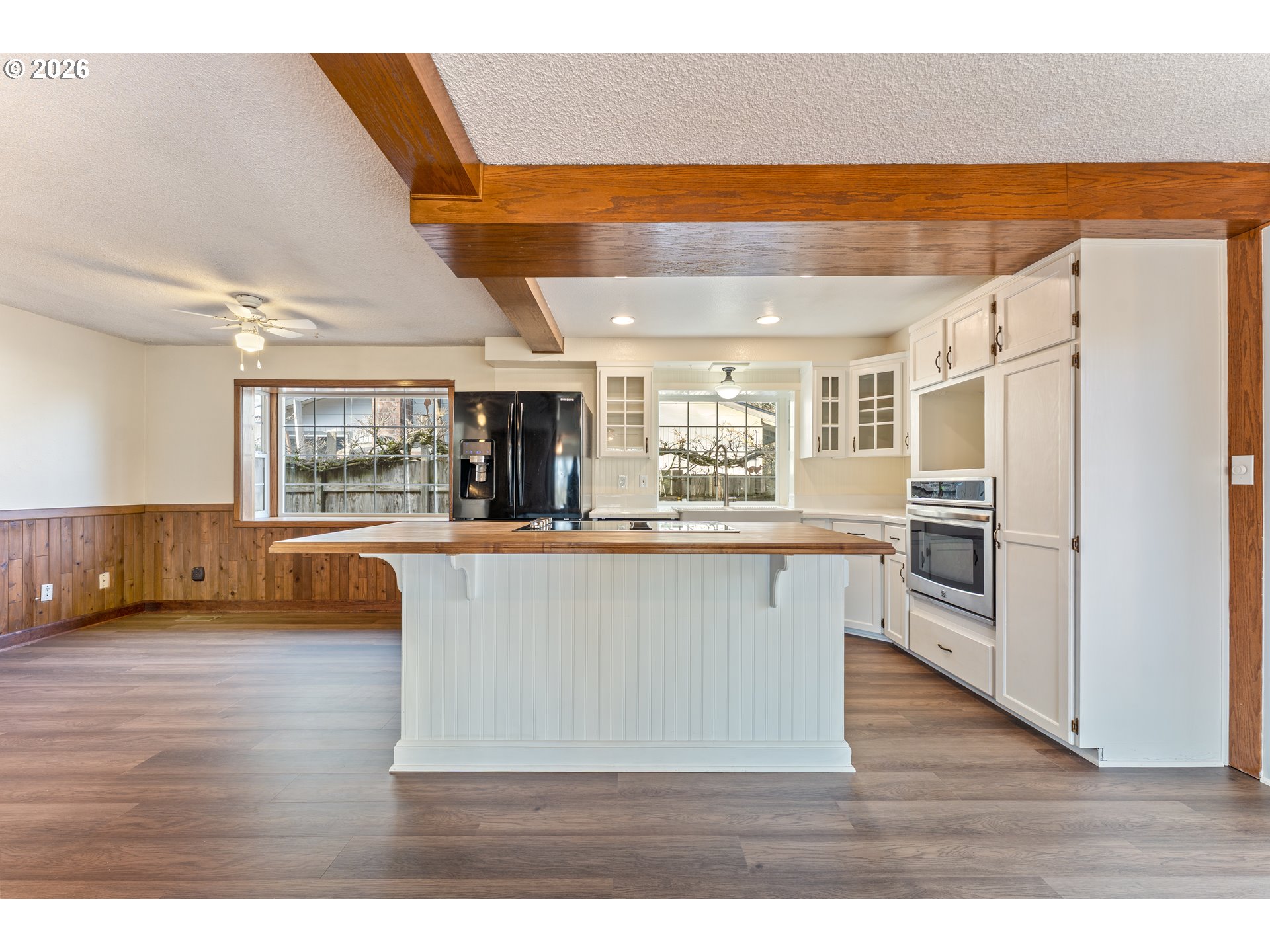 624 South 12th Street St. Helens, OR 97051 - Photo 12 of 45 a living room with stainless steel appliances furniture and a kitchen view