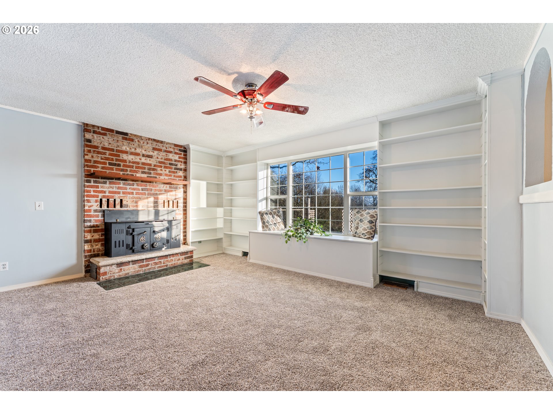 624 South 12th Street St. Helens, OR 97051 - Photo 7 of 45 a view of an empty room with a window