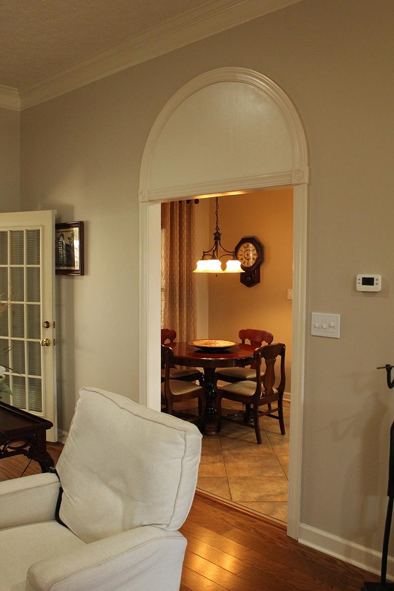 175 Windale Drive Jackson, TN 38305 - Photo 16 of 25 Living room with ornamental molding and wood-type flooring
