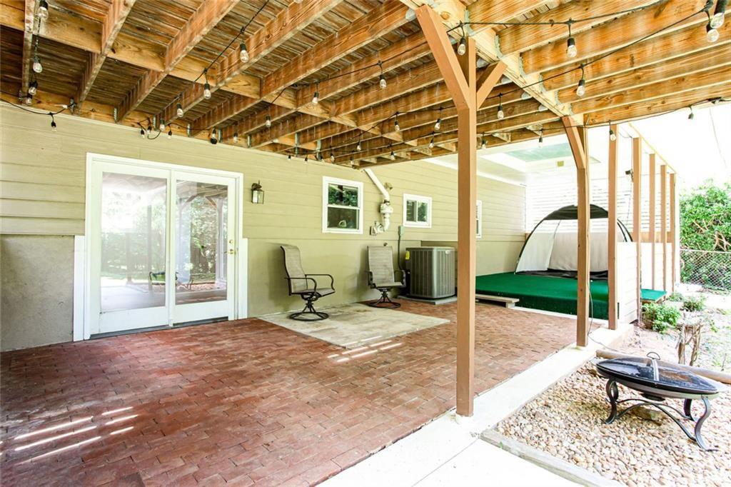 2814 Goodfellows Road Tucker, GA 30084 - Photo 36 of 46 a building outdoor space with patio furniture and wooden floor