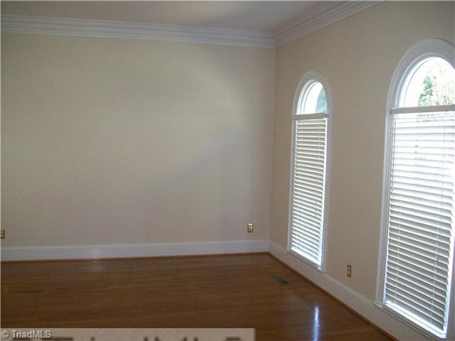 3009 Alamance Road Greensboro, NC 27407 - Photo 2 of 14 Living Room. Hardwood floors and beuatiful mouldings in this great living room.