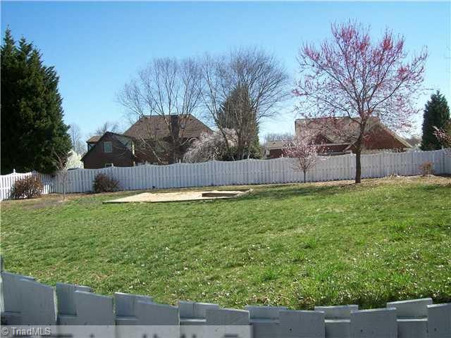 3009 Alamance Road Greensboro, NC 27407 - Photo 13 of 14 Yard/Garden. Backyard is fenced with space for garden.