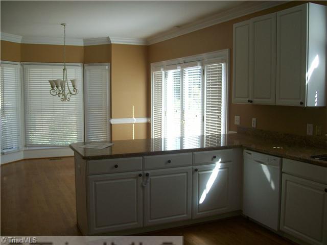 3009 Alamance Road Greensboro, NC 27407 - Photo 6 of 14 Kitchen. View of litchen and breakfast area that opens to deck.