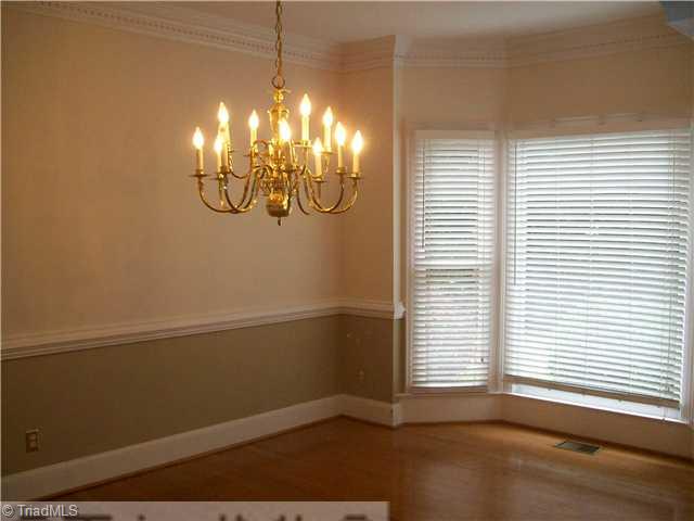 3009 Alamance Road Greensboro, NC 27407 - Photo 7 of 14 Dining Room. Dining room with bay window and hardwood floors.