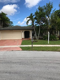 11221 Malayan Street Boca Raton, FL 33428 - Photo 1 of 19 Front