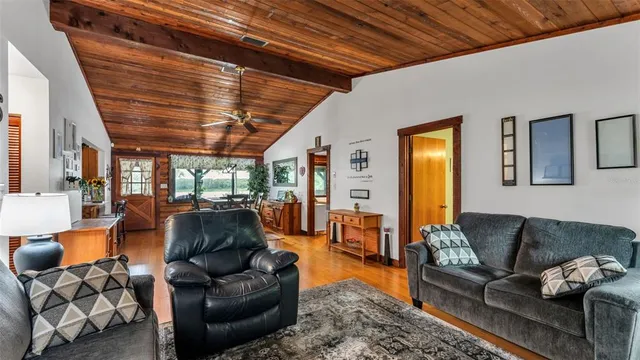 a kitchen with stainless steel appliances granite countertop a refrigerator and a stove